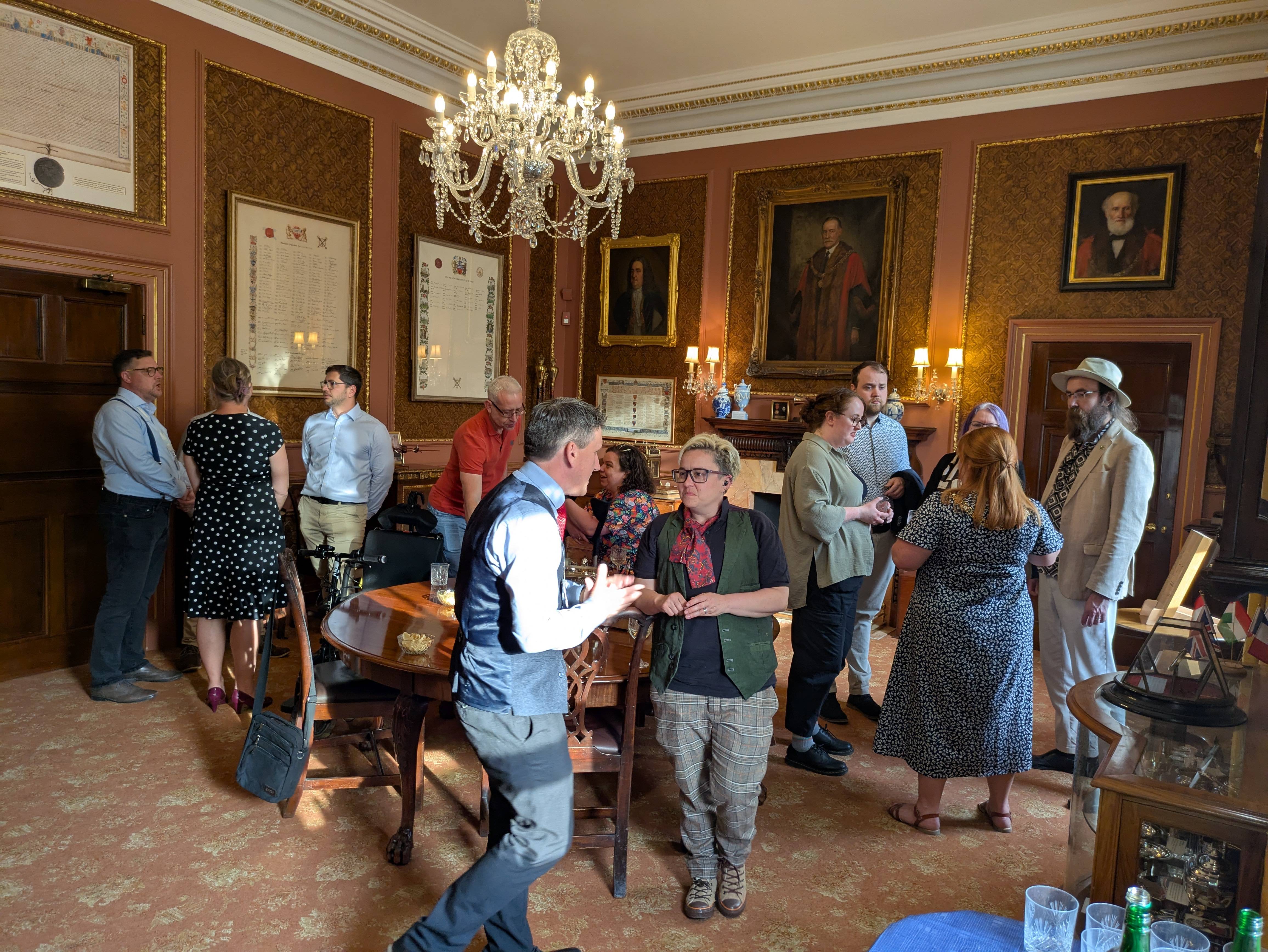 Bath Pride people hobnobbing with the council and the mayor.